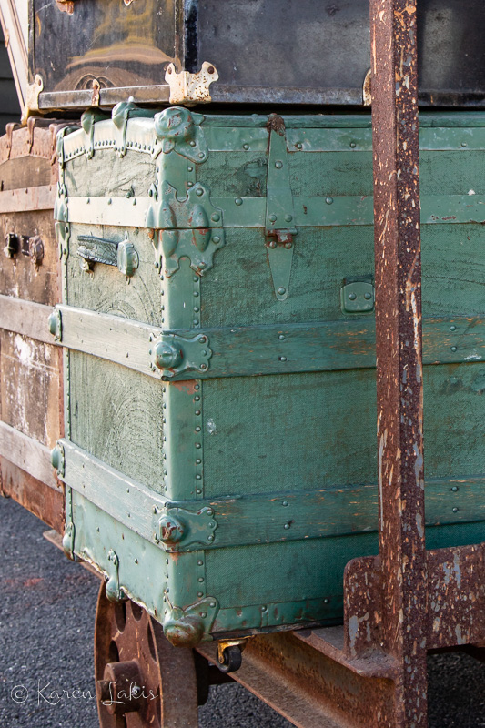 trunks on rusty luggage rack