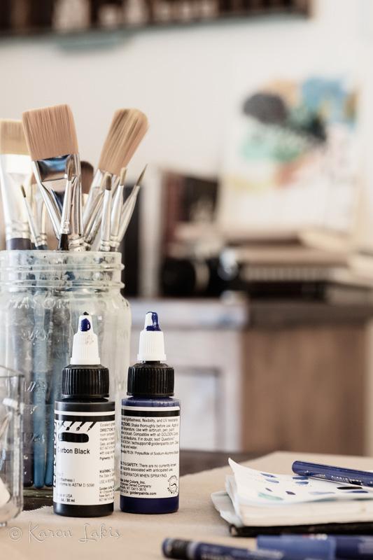 art supplies with dresser blurred in background