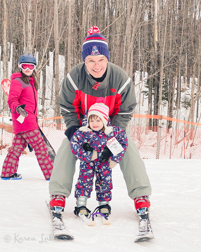 Greg and Ella skiing