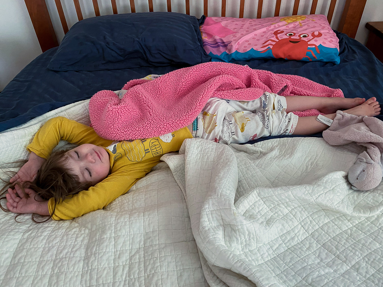 Ella sprawled on the bed